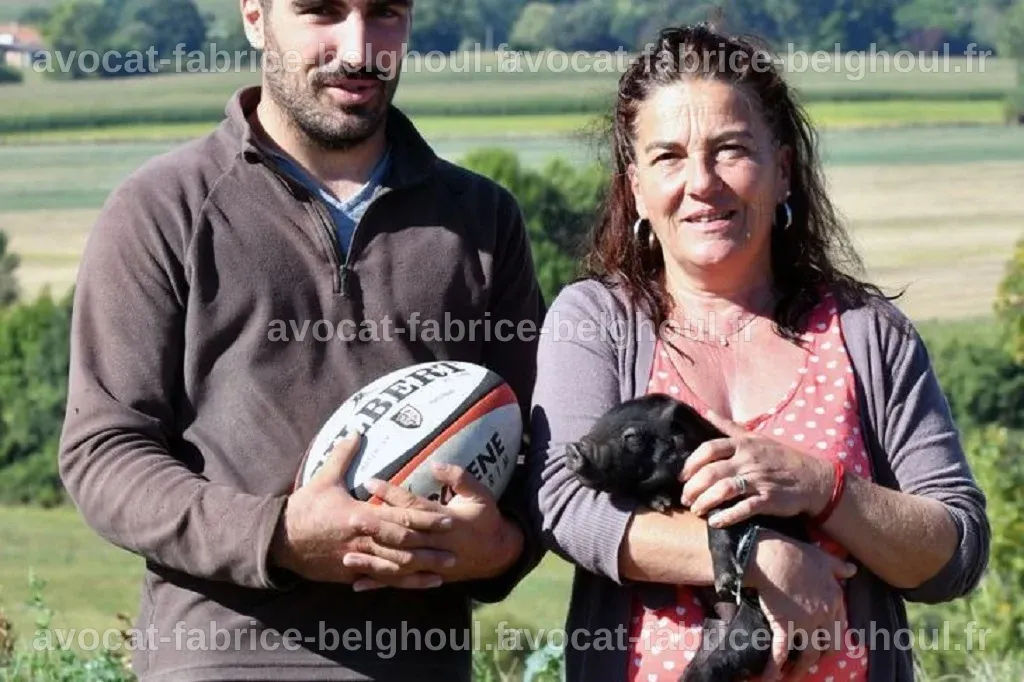 Jean Dupont et Marie-Pierre, les parents d'Antoine Dupont, souriants ensemble.